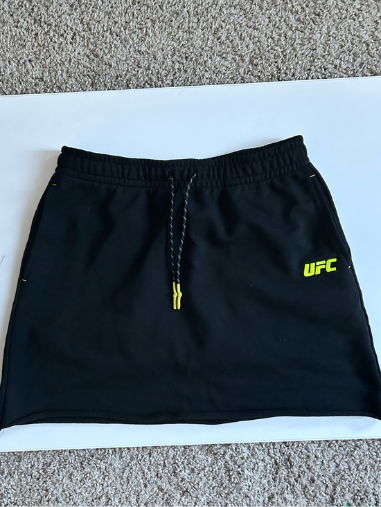 UFC Dresses & Skirts - UFC Black Skirt with Neon Yellow Logo Accents